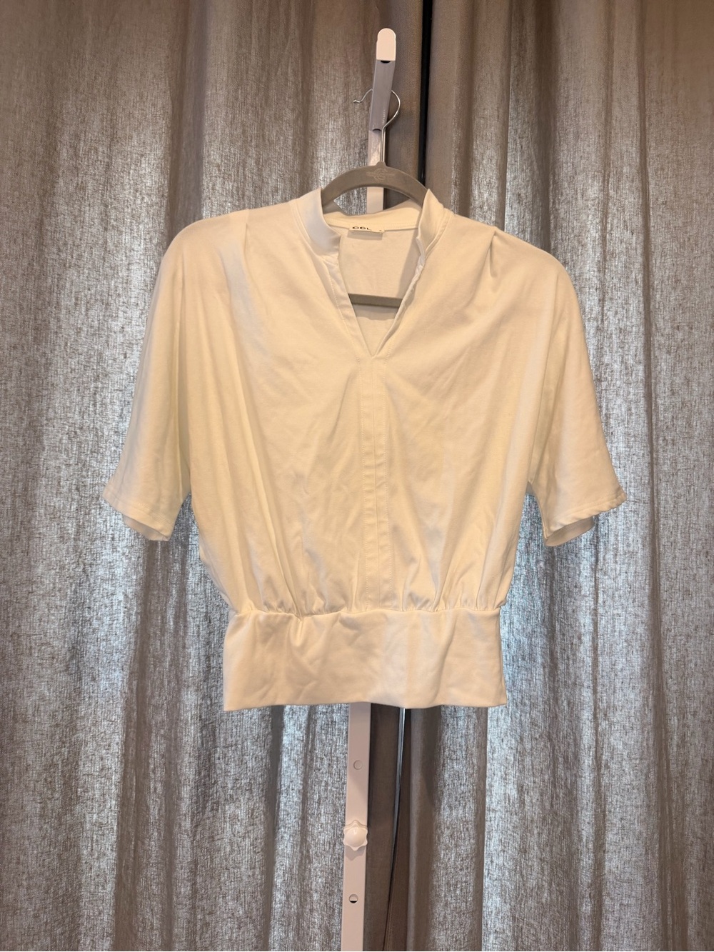 OGL Relaxed White V‑Neck Short Sleeve Top